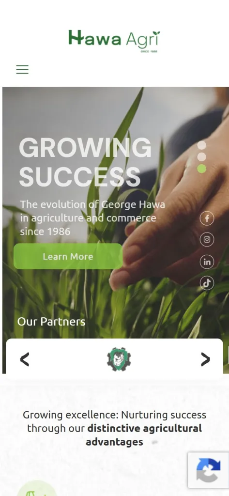 Hawa Agri homepage on a mobile phone, with the Growing Success headline and a Learn More button