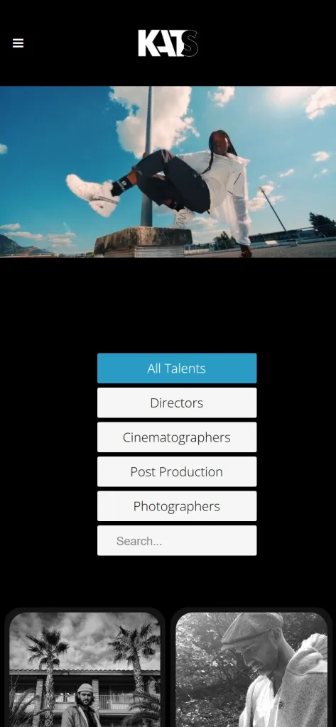 Kats Media homepage on a mobile phone, with a featured image, talent category filters and artist cards