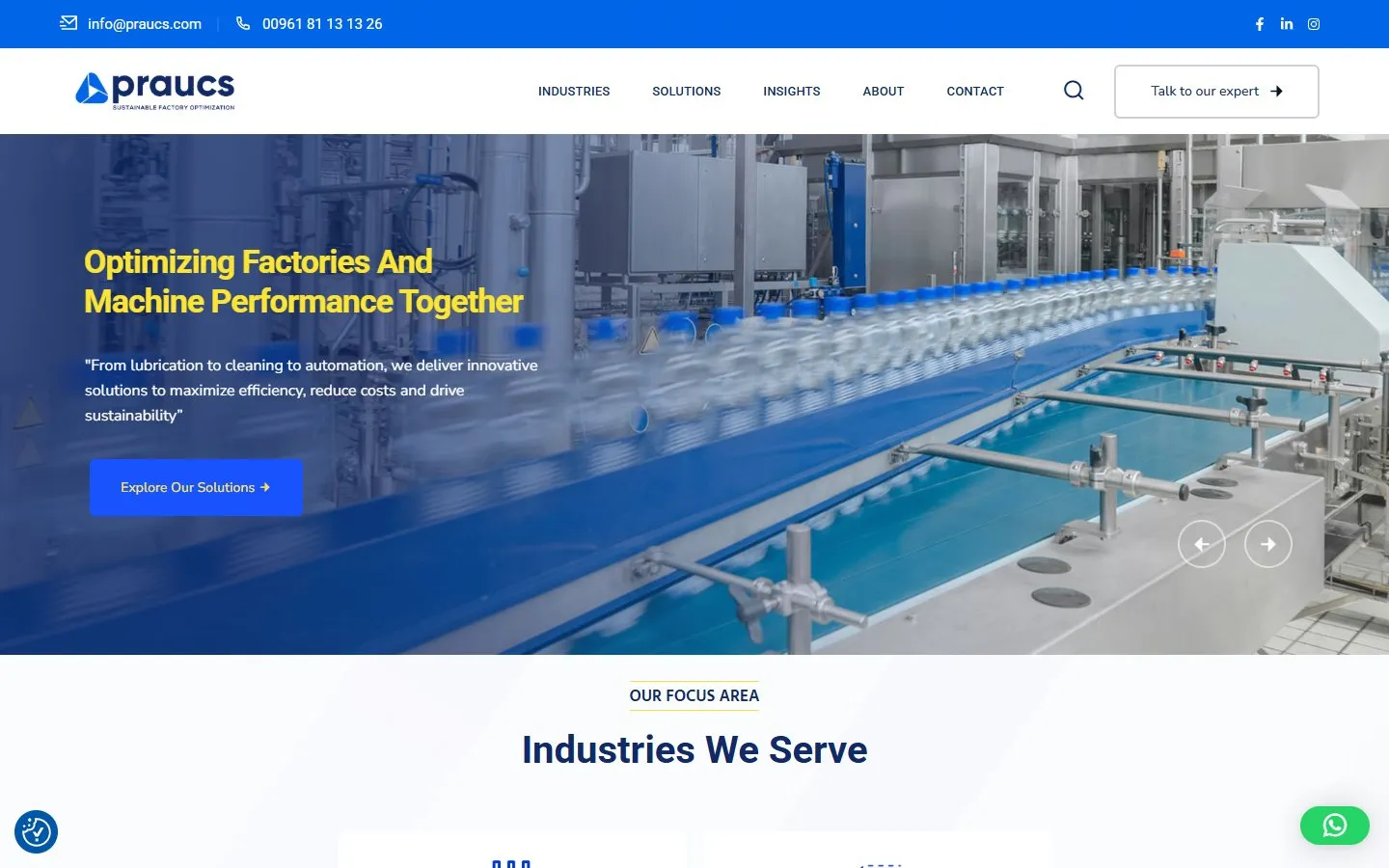 PRAUCS homepage on desktop, with a bottling-line photo, the headline Optimizing Factories And Machine Performance Together, and an Explore Our Solutions button